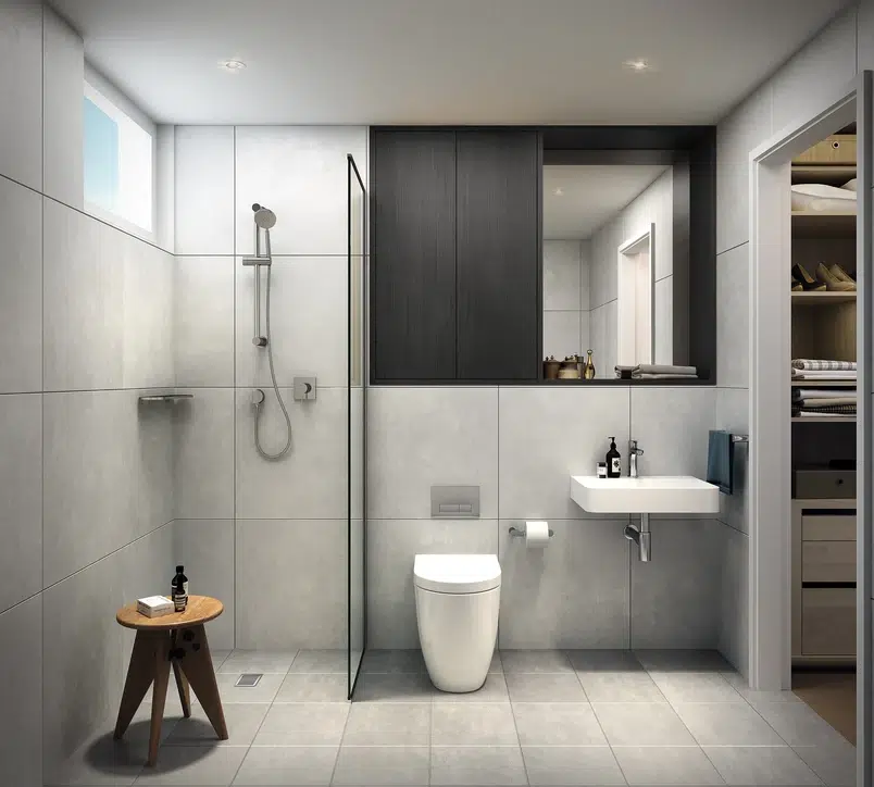 a modern bathroom with a toilet and sink.